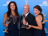   -    " -".  13     Emmy