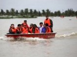 Уже более 440 тысяч человек эвакуированы за последние дни на острове Хайнань (Южный Китай) из-за наводнений