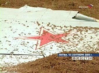 Обломки Су-27 в Литве. Кадр телеканала "Россия", архив Обломки Су-27 в Литве. Кадр телеканала "Россия", архив