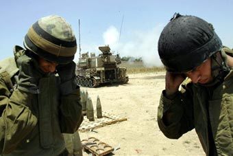 Израильские военные у границ сектора Газа. Фото AFP Израильские военные у границ сектора Газа. Фото AFP