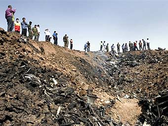 �� ����� �������� ��-154 � �����. ���� &copy;AFP