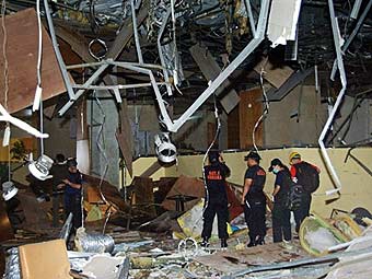 ������� �� ����� ������ � ��������� Ritz Carlton � ��������. ���� &copy;AFP